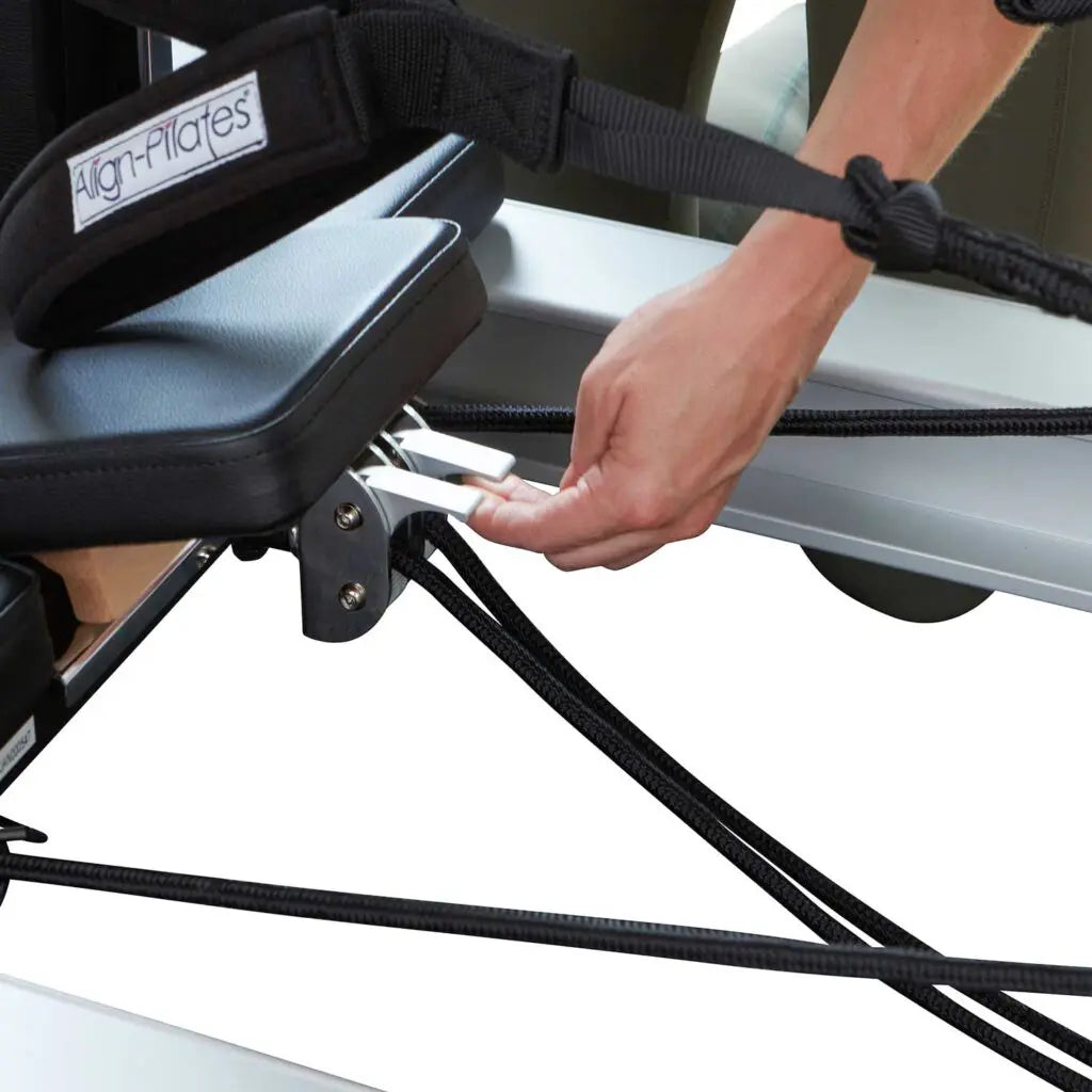 Align Pilates Pro Rope Adjusters am Reformer montiert
